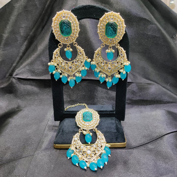 Kundan earrings with tika